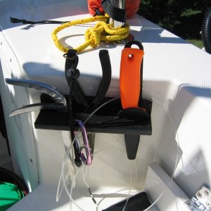 Small rack for fishing pliers, knife, etc.