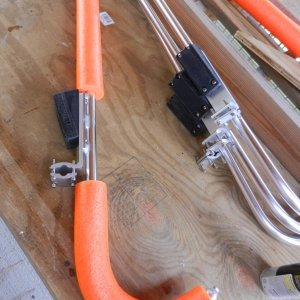 Media 'I slid some pool noodles onto the 1\" tubing for cushion.' in album 'I had a local alumiinum guy bend some 1\" tubing and weld some end straps and a plate on each.  Plate location was an appoximation (with measurements) of the roof rail location.'