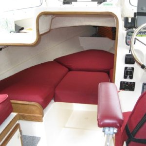 Modifications--Teak trim on opened up v-berth bulkhead