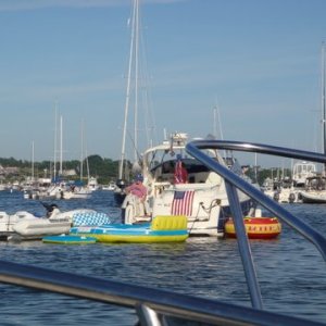 Various water toys right up in front of our raft of of three C-Dory's waiting for tonights July 3rd firewoks display