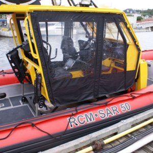 Southbound-DSC06577  Port McNeill - Rescue boat - It has quite the suspension system.  The volunteer claimed that on the military model, a sniper can sit on the roof and shoot while the boat does 30 knots through a chop.
