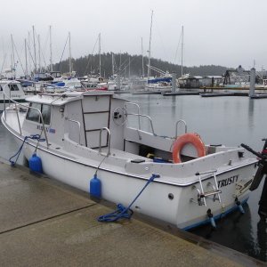 Not sure what kind of boat this is, but looks seaworthy enough to cruise anywhere in the world!