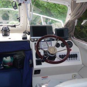Moved Garmin 4208 over added a Lowrance multifunction GPS with a second transducer, added Garmin HD radar and Garmin fuel managment to the 4208 package.Wired in GPS output from the )183 cable for GPS position output to my Coastal Explorer to show the boat position on the laptop via the Coastal Explorer software. Added portable USB type GPS  puck velcroed down near the windshield so my laptop running Coastal Explorer can work as a third independent nav device while in cruising mode