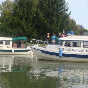 Last Dance and Knot Flying getting ready to settle in for the night at Spencerport New York Erie Canal 2009. The girls already pumping a local for info on the area.
