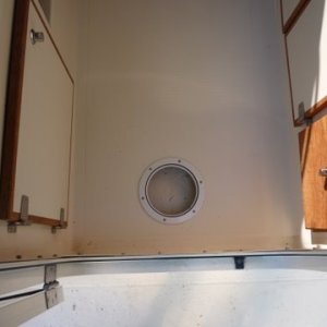 inspection hole with deck plate at the rear of the cabin