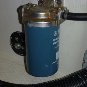 getting rid of this solid canister type filter Racor makes one that spins on to the same head that has a ten micron filter and plastic bowl with a drain valve so you can see water and drain it. The bowl spins on to the bottom of the filter pictures coming. Available from Sims Yamaha for less than sixty bucks. Replacements are available by themselves for $20.72 eac.