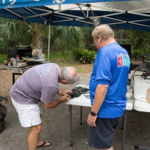 Dave and Marc set up for surgery on the pig....Now putting the blade in a Sawzall is not rocket science...or is it?