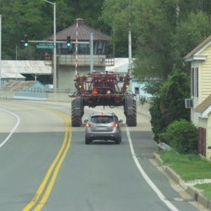 May 1st is planting time, huge fertilizer spreader crossing the Sassafras