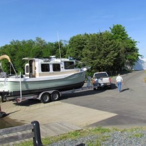 27'Ranger towed by a 2011 Chevy one ton pickup with a Duramax diesel owner says it pulls it like there is nothing there. Hull weight 6500 pounds. Nice new Float On trailer. This guy knows how to live.
