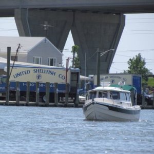 Dun Smith and his Cresent Girl. Kent Narrows provides a short cut to avoid having to go out and thru the Chesapeake Bay Bridge.