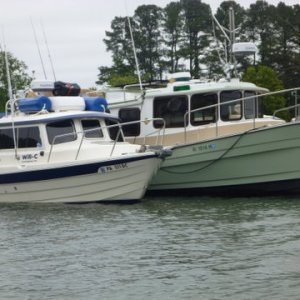 Anchored and rafted up the Ranger tug has a 25 pound Rockna so we just let him do all the heavy lifting with his windless, we are probably in about 6 to seven feet of water here at low tide. Short dink ride to town, very quiet here, except for the tree frogs at night.