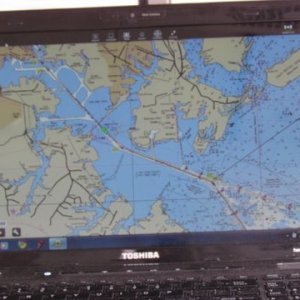 screen shot of us heading into Baltimore. the black line heading off to the right from were the two channels form a Y is the next days heading to the other side of the bay put the green boat on the line click on the autopilot and watch for debris etc steer with hand held auto pilot remote control,that leaves our 4208 Garmin to run radar or a chart with radar over lay