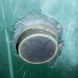 Media 'Thru-hull transducer protruding thru hull. This kind of scares me. What if it gets scraped off and leaves a hole in the cockpit floor?!' in album 'Helm area w/cabinets removed.'