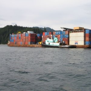 Tug and barge waiting for slack at Seymour Narrows, BC