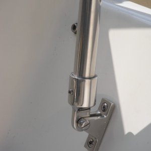 Detail shot from the other side.  Note: buy the hardware (14" SS bar, base and bar end) from your local canvas shop.  Shepherd Canvas charged me $18 for this gear; West Marine would have been closer to $75!