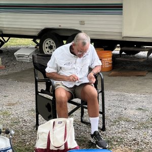 Media 'John studying his notes' in album 'Socializing at the slips'