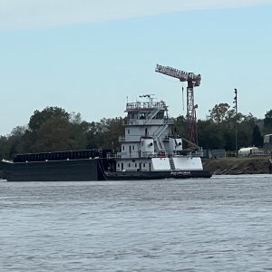 Tug hooking up new barge
