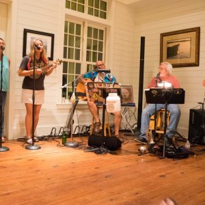 Media 'The entire ensemble.' in album 'Because of the fun that all of this had this year at Apalachicola, watching the dogs--this is the title photo!'