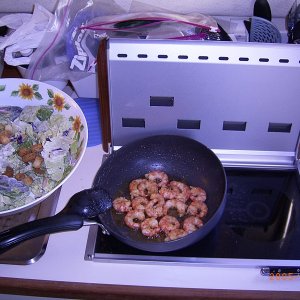 (Fishtales) Shrimp sauteed in butter and garlic with salad