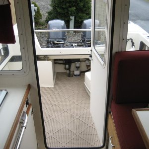 Media 'View from cabin to stern.  Wallas to starbd, table on port, porta-pottie hiding to port in cockpit.' in album 'Jim's Dorie comes to NineVista and begins the transformation to Sleepy C'