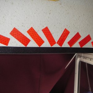First "modification" is this reflective tape over the door,to help with not bumping heads.