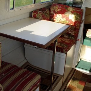 Media 'Gaucho Table and Seat' in album 'New Portside Sofa Through Helm Window'