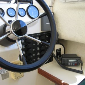 Media 'Helm with VHF and autopilot.' in album 'Cabin port/aft.'
