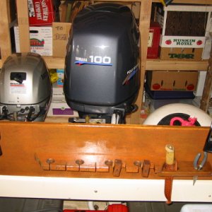 OEM pole-holder teak bracket.