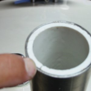 slit in pvc to squeeze liner into stainless tube