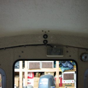 Inside view of washers and nuts to attach rocket launcher -- required lowering of inside light