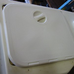 shows fit of new cover...slightly undersize, thus necessitating the fiberglass work