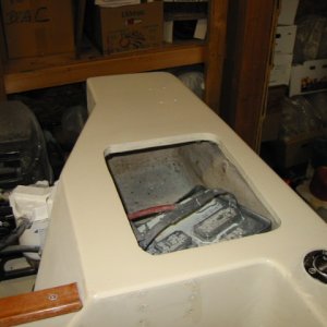 first coat of brushable top coat -- Hatteras off-white a real close match.  Dries smooth as glass.  Will need some sanding and another coat