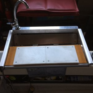 Over rail fish cleaning tray