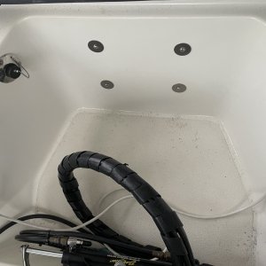 fender washers on the backside hold mounting bolt heads in the motor well