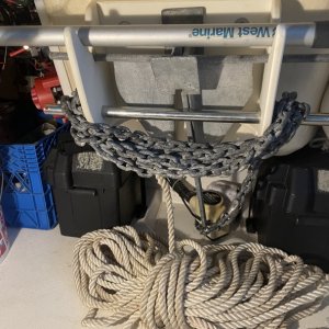 Media 'the stainless bar pulls out to instantly release all the chain with the rope coiled on the floor (Behind spare gas container and cooler)' in album 'THE PROBLEM: It\'s large milk crate was taking up almost all the starboard aft storage area.  I bought a vertical mount that didn\'t fit, so I made this one.'