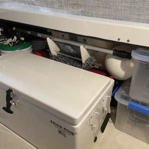 Media 'the whole thing goes behind the cooler tucked away but at the ready? makes a handy spot for the boat hook.' in album 'THE PROBLEM: It\'s large milk crate was taking up almost all the starboard aft storage area.  I bought a vertical mount that didn\'t fit, so I made this one.'