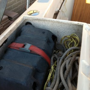 Media 'Here's the house battery all snuggled in.' in album 'Port lazarette: this is where the house battery is going. Drilled a hole for the cables, added a grommet and some anchors for the battery hold down strap.'