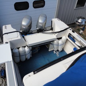 Aft deck with Grill, Platform for Cooler and Side Table.    New Lazerette Covers too