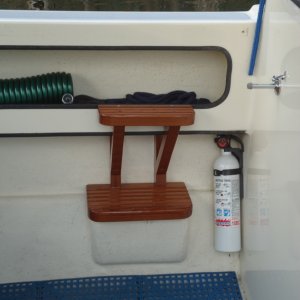 These steps along with a zipper on the Bimini made boarding a breeze.  It may be the most useful thing I have done to the boat.