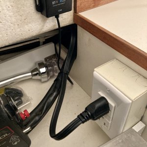 014 there's an outlet right by the throttle so I can just plug it in when using shore power (keep it simple sailor)