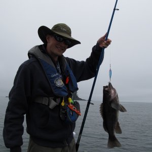 That black item hanging left of the pouch is just a remote for my trolling motor and not safety related or always worn.