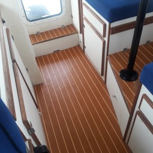 Lonseal teak/holly floor.