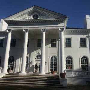 Bill and Rosanne in front of the Mansion