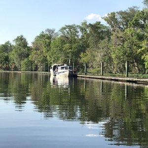 C Traveler and Mystery Girl at dock on 6 Mile Creek