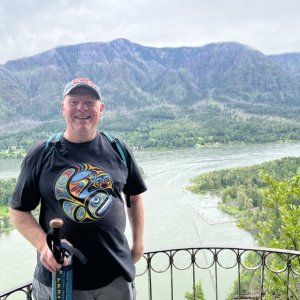 Colby on Beacon Rock with the docks in the background