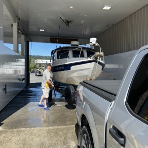 Media 'Cleaning the scum off C-Traveler after slinging out at Cap Sante' in album 'Mitchell, SD Walmart'