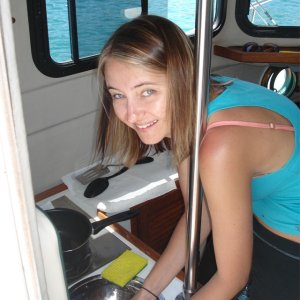 The queen of the cabin doing some dishes.