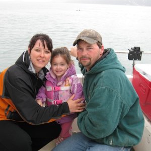 Jamie, James, and Makena, sea otters in back