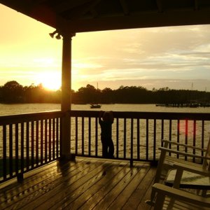 Thessaly watching sunset from Whittaker Point Marina clubhouse.