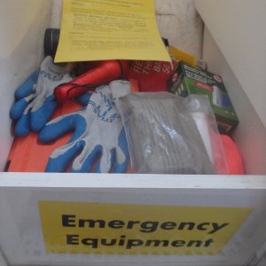 Emergency equipment handy at helm
